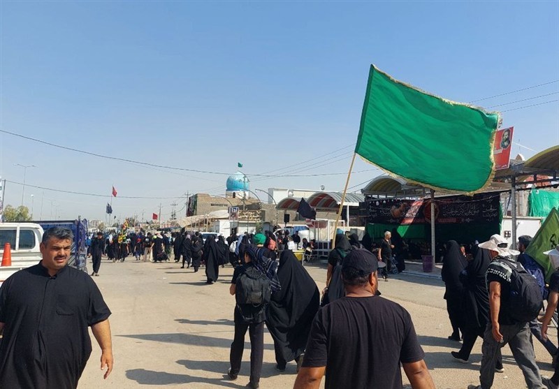 اهتزاز پرچم یا حسین(ع) در حیدریه؛ روایت مقاومت، عهد و انتظار در مسیر کربلا