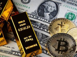 مدیر گلدمن ساکس: دلار سقوط می‌کند، طلا و بیت کوین ابزار پوشش ریسک مناسبی هستند